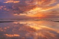 Sunset reflections on the beach, Texel, The Netherlands Royalty Free Stock Photo