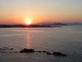 Sunset reflections from a calm sea, Chania, Crete Royalty Free Stock Photo