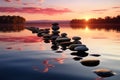 Sunset reflections dance upon the Zen stones nestled in peaceful waters Royalty Free Stock Photo