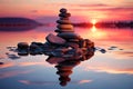 Sunset reflections dance upon the Zen stones nestled in peaceful waters Royalty Free Stock Photo
