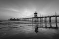 Sunset reflections and the pier in Huntington Beach, Orange County, California Royalty Free Stock Photo