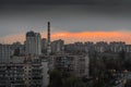 Sunset in a residential area built up with multi-storey concrete prefabricated houses.