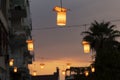 Sunset on a resort with lanterns illuminating the romantic scene.