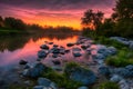 beautiful orange sunrise river landscape with stone around it Royalty Free Stock Photo