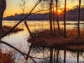 Sunset on the river walk path during fall Royalty Free Stock Photo