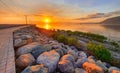 Sunset on Road on Palisadoes a thin strip of sand that serves as a natural protection for Kingston Harbour, Jamaica