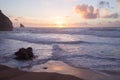 Sunset at rocky Atlantic ocean coastline of Adraga beach