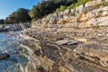 Sunset rocky beach in Istra, Croatia. Royalty Free Stock Photo