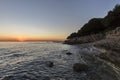 Sunset rocky beach in Istra, Croatia. Royalty Free Stock Photo