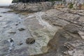 Sunset rocky beach in Istria, Croatia. Adriatic Sea, Lanterna peninsula. Royalty Free Stock Photo