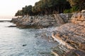 Sunset rocky beach in Istria, Croatia. Royalty Free Stock Photo