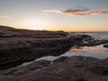Sunset on rocky beach, Red Bluff, Kalbarri, Western Australia Royalty Free Stock Photo