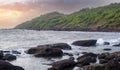 Sunset in a rocky coastline Royalty Free Stock Photo