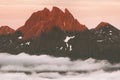 Sunset rocky mountain and clouds aerial view