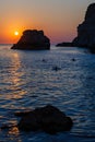 Sunset on the rocky seashore