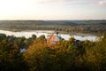 Sunset Rural autumn Polish scenery with church, forest and river. Polish countryside scenery Royalty Free Stock Photo