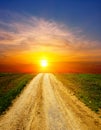 Sunset on rural road Royalty Free Stock Photo