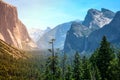 Sunset's golden light moves across Yosemite Valley's waterfalls Royalty Free Stock Photo