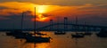 Sunset and sailboats in Newport, Rhode Island.