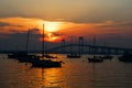Sunset and sailboats in Newport, Rhode Island.