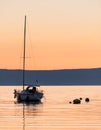 Sunset with sailing boat in Cres