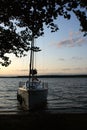 Sunset sailing yacht sailboat moored on a dead lake Royalty Free Stock Photo