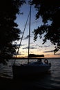 Sunset sailing yacht sailboat moored on a dead lake Royalty Free Stock Photo