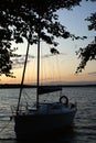 Sunset sailing yacht sailboat moored on a dead lake Royalty Free Stock Photo