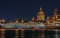 Sunset in Saint Petersburg over the Neva river with the view of the Blagoveshchenskiy Bridge and the Saint Isaac& x27;s Cathedral Royalty Free Stock Photo