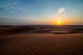 Sunset on sand dune in Wahiba sands desert near Bidiyya in Oman Royalty Free Stock Photo