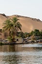 Sunset, Sand dunes on the Coastline of the Nile river part called First Cataract, Aswan Egypt Royalty Free Stock Photo
