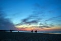 Sunset on a sandy beach by the Baltic sea in the evening Royalty Free Stock Photo