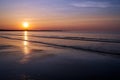 Sunset on a sandy beach on the Baltic sea in the evening Royalty Free Stock Photo