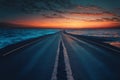 sunset scene of empty asphalt highway and blue ocean