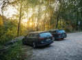 Sunset scene with rear view of two Volkswagen Passat Electric cars parked in