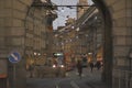 Sunset scenes from the center of Bern with people on the street, tourist sights and legendary trams or buses.