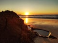 A sandpile on the sunset beach