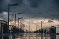 Sunset on a sea bridge after rain in Bulgaria. Reflections on ground. Amazing sea landscape. Fisherman waiting for fish. Royalty Free Stock Photo