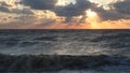 Sunset sea clouds rays