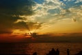 Sunset on the sea coast, mysterious pictures in the sky