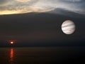 sunset on the sea and jupiter background in the space