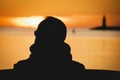 Sunset sea with a man Royalty Free Stock Photo