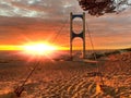 sunset at sea maritime bridge gate in the sun light beach people walking romantic couple stay on sand reflection on sea water wa