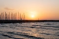 Orange Mediterranean Sunset over yacht harbor in Tel Aviv, Israel
