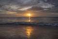 Sunset on the sea with silhouette of man with a Paddle on a SUP board Royalty Free Stock Photo