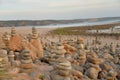 Sunset and sea stone towers at Vila Nova de Milfontes beach Royalty Free Stock Photo