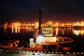 Sunset in the seaport of Odessa. Night views of piers and ships. Royalty Free Stock Photo