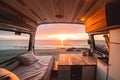 Sunset seen from back of camper van with beach landscape. Concept of nature and having freedom in holiday