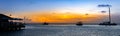 Sunset over the ocean on palm beach in Aruba`s West coast tourist destination Royalty Free Stock Photo