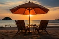 Sunset setting with aligned lounge chairs and umbrellas, summer landscape image